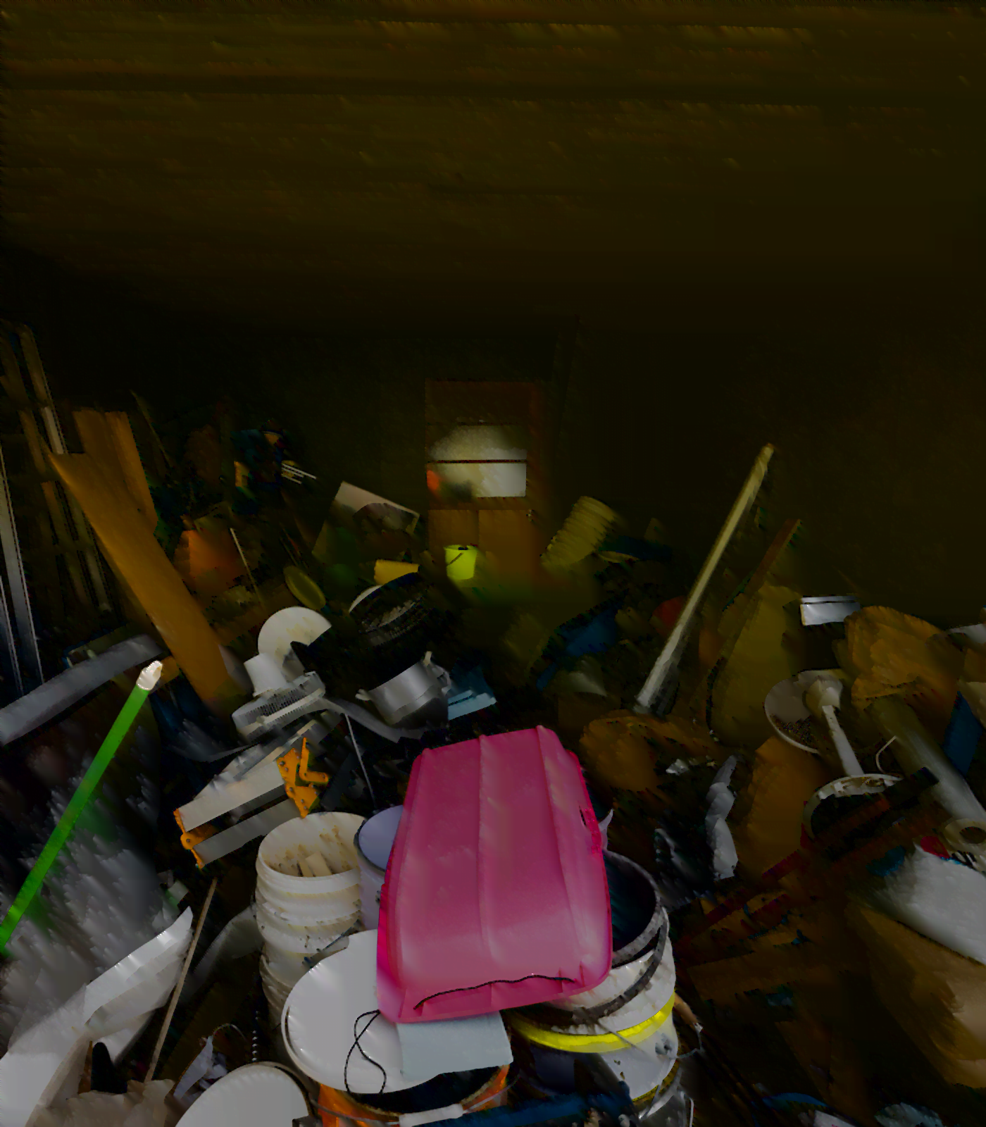 pile of hoarded items within a garage