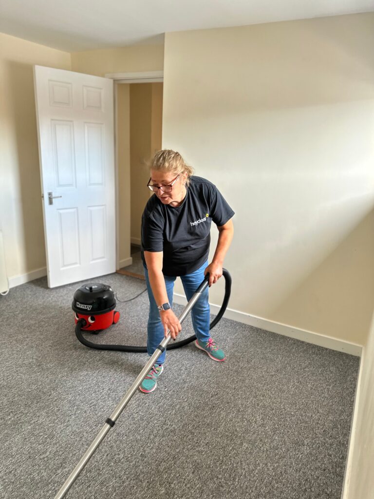 Jenny conducting a house cleaning service