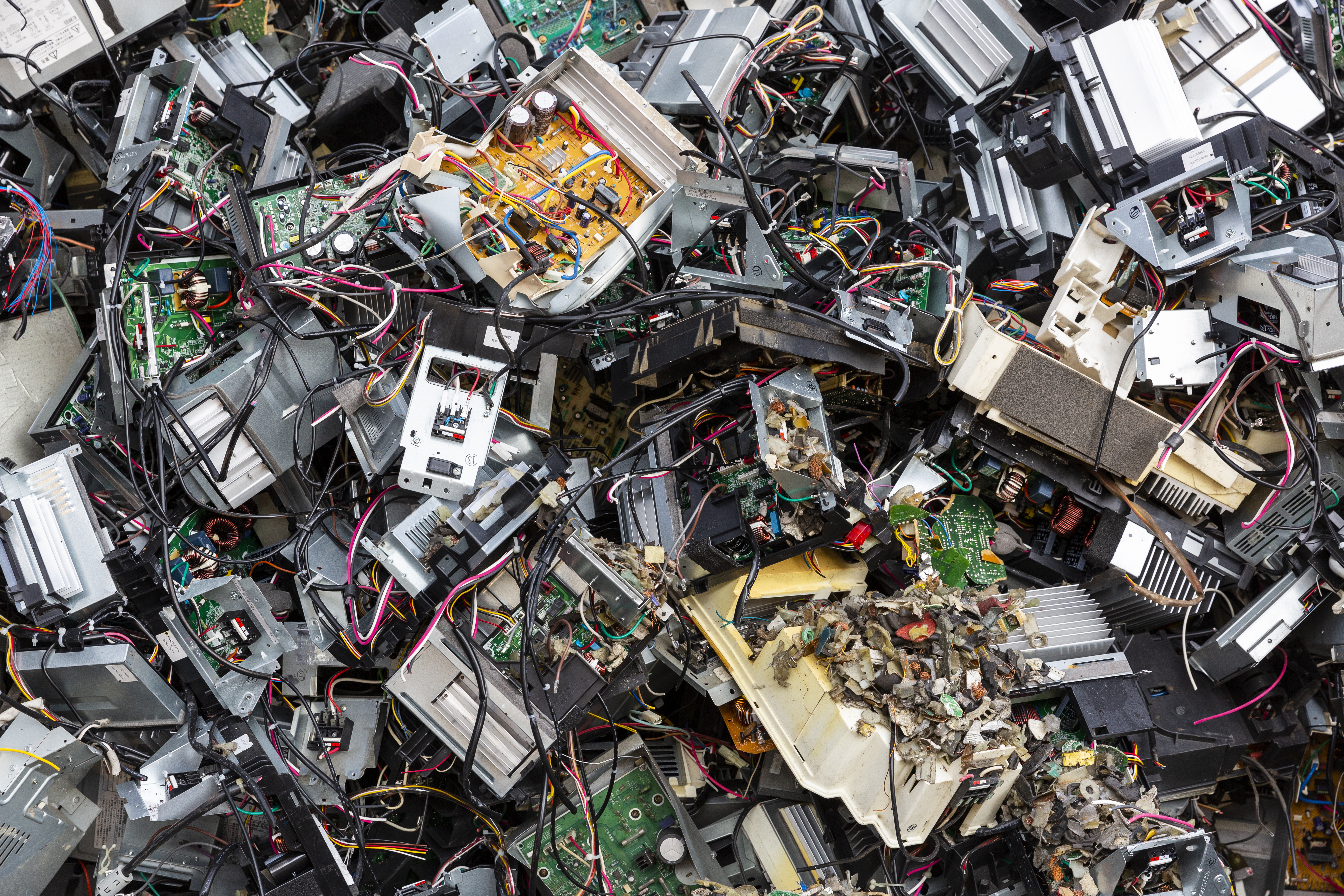 a pile of electrical waste components, such as, circuit boards wiring, drives etc.