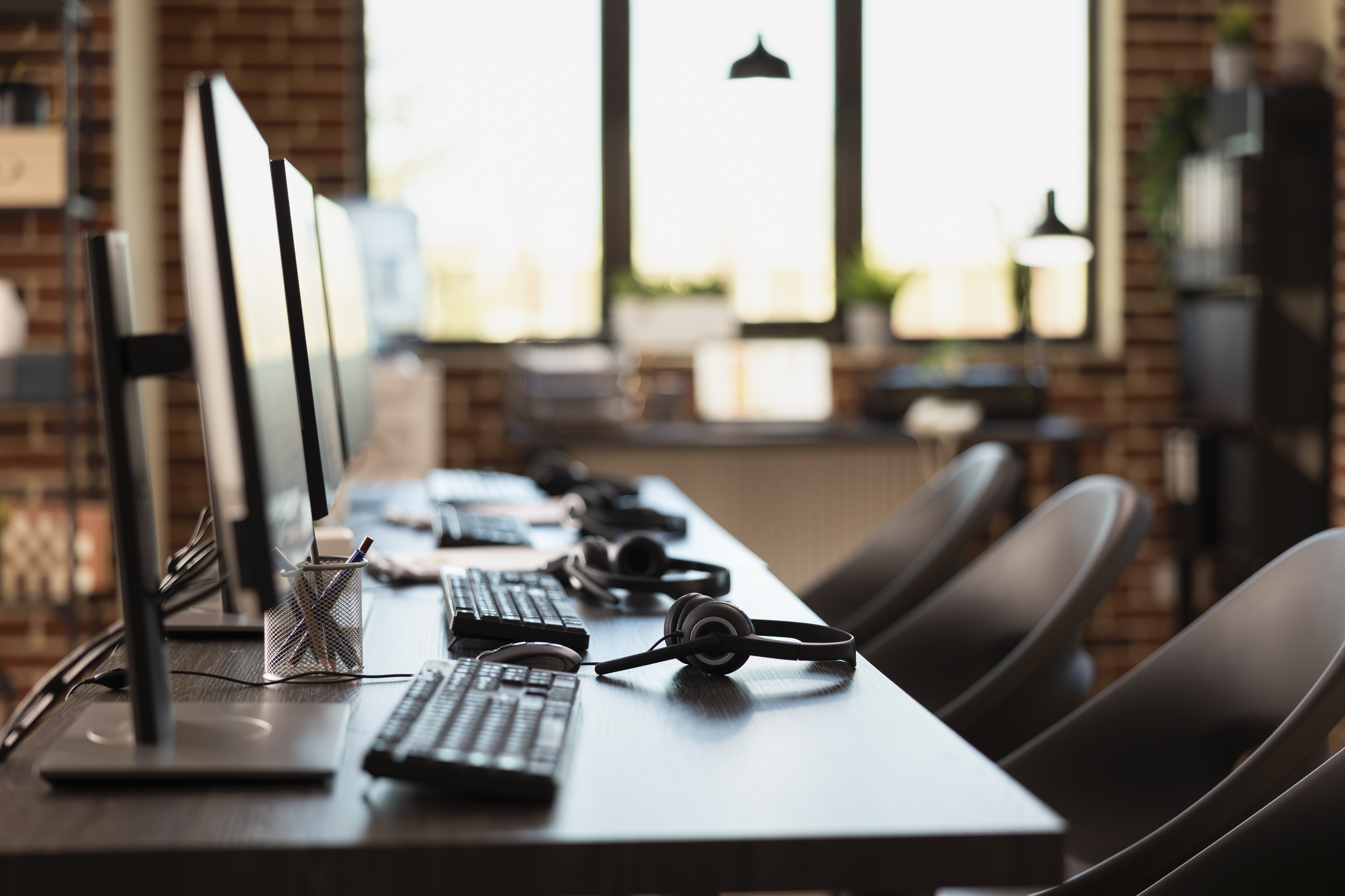 Computers in an office, to help represent Secure ITAD Asset Disposal